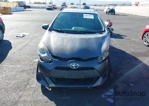 2015 Toyota Prius C One z USA, uszkodzony, nr VIN JTDKDTB34F1581740